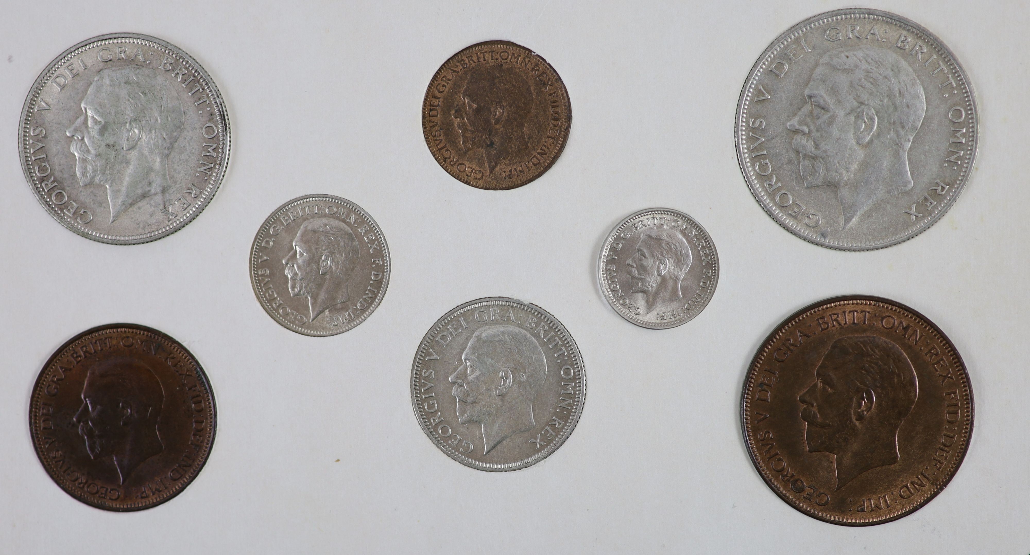 A George V specimen set of nine coins, 1932, fourth coinage, comprising Crown, (S4036), cleaned otherwise about EF, halfcrown and florin, cleaned otherwise good VF or better, shilling, sixpence and threepence, cleaned ot
